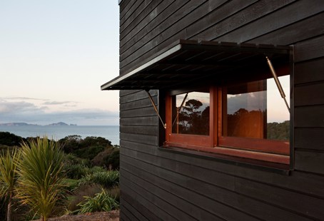 Gas-operated struts enable timber window coverings to be easily secured.