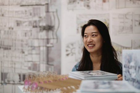 Kun Tao with her exhibition set up for Dairyland